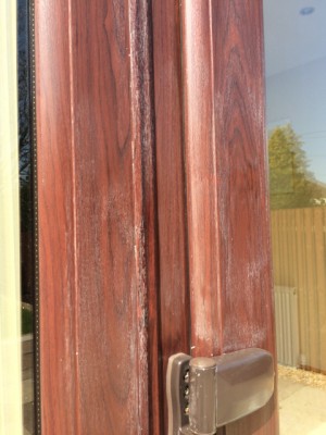 Discoloured Roswood UPVC - close up.jpg