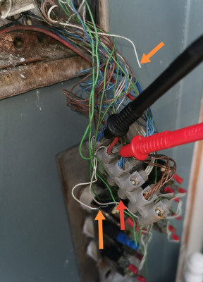 there are another couple of disconnected wires (shown by the orange arrows).  Someone has suggested that the top orange goes where the red arrow is pointing but didn’t comment on where the other wire should go