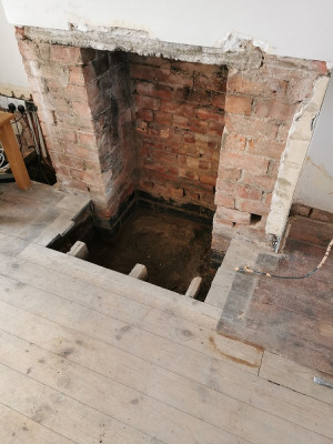 Living room hearth after removal below DPC