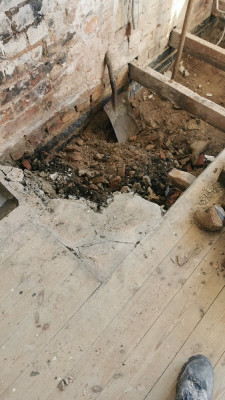 Dining room hearth before removal. Now removed all the way down to oversite.