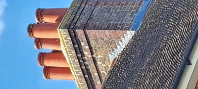 tilting chimney pot pixel resize.jpg